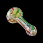 Colorful glass smoking pipe against a black background.