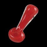 Red glass pipe isolated on a black background.