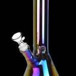 Iridescent glass water pipe (bong) against a black background.