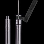 Silver cannabis dab pen with glass mouthpiece, shown disassembled and assembled.