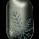 Emerald green cannabis vape pen with etched snowflake design.