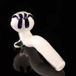 A studio shot of the White Fritted Sherlock with Black 'Daisy' Fritted Bowl, showcasing its patterned glass and curved design.