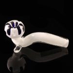 Front view of the White Fritted Sherlock with Black 'Daisy' Fritted Bowl, resting on a reflective surface with a detailed, patterned bowl.