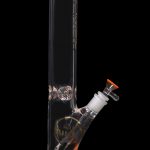 Orange glass bong with intricate design and visible water level.