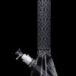 Clear glass bong with intricate frosted geometric patterns and a detachable downstem.