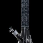 Front view of the Cloud Cali X 15-inch Engraved Thick Base Beaker Water Pipe, displaying a detailed engraved pattern on clear glass.
