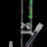 Glass bong with percolator and detachable downstem, isolated on a black background.