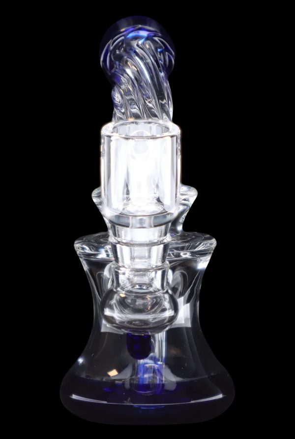 Clear glass dab rig with blue accents, illuminated from within.