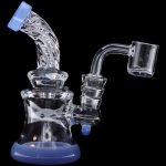 Blue and clear glass dab rig with a quartz banger.