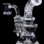Clear glass dab rig with quartz banger, isolated on a black background.