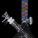 Glass water pipe (bong) with colorful geometric patterns against a black background.