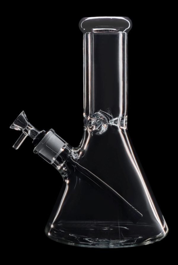 Clear glass bong isolated on a black background.