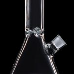 Clear glass bong against a black background.