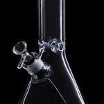 Clear glass bong with blue accents, featuring a downstem and bowl.