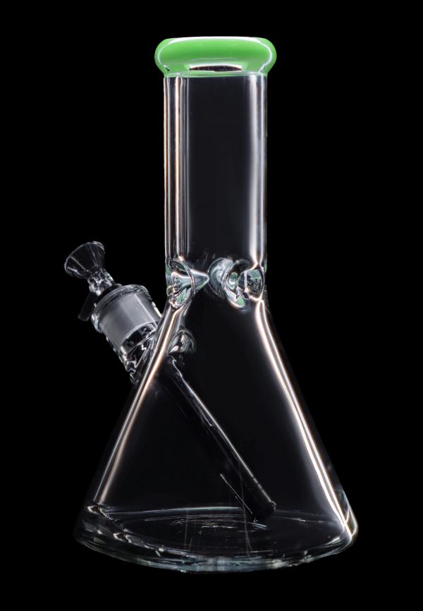 Clear glass bong with green accents against a black background.