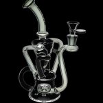 Clear glass water pipe (rig) with intricate curves and a bowl piece, isolated on black.