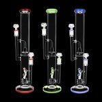 Three glass bongs with colorful accents, isolated on a black background.
