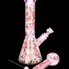 Pink glass bong with peach design and accompanying bowl piece.
