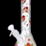 Glass bong decorated with red roses and green accents.