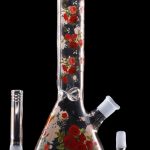 Front view of the 10" Flower Decal Beaker Bong, displaying a floral decal on clear glass with a wide base and narrow neck.