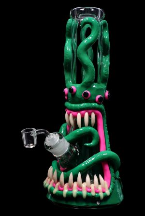 Green glass water pipe shaped like a monster with tentacles and sharp teeth.