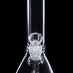 Clear glass bong with blue accents, isolated on a black background.