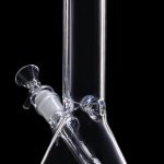Clear glass bong with blue accents against a black background.