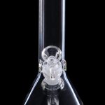 Clear glass bong with intricate bubble perc filter, isolated on black.