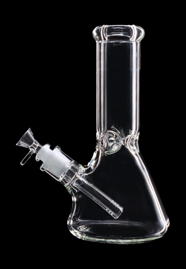Clear glass bong isolated on a black background.