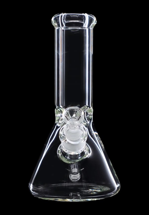 Clear glass bong against a black background.