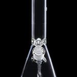 Clear glass bong isolated on a black background.