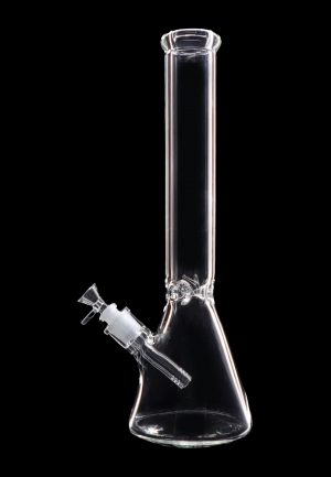 Clear glass bong against a black background.