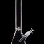 Clear glass bong against a black background.