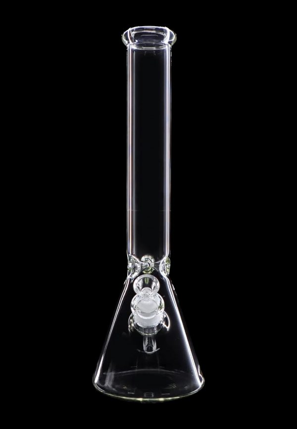 Clear glass bong against a black background.