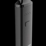 Front view of the XVAPE Avant Dry Herb Vaporizer, a sleek, black handheld device against a dark background.