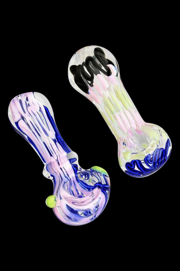 A close-up, angled view of the Worked Slime Strands Hand Pipe, showcasing its colorful glass swirls against a dark backdrop.
