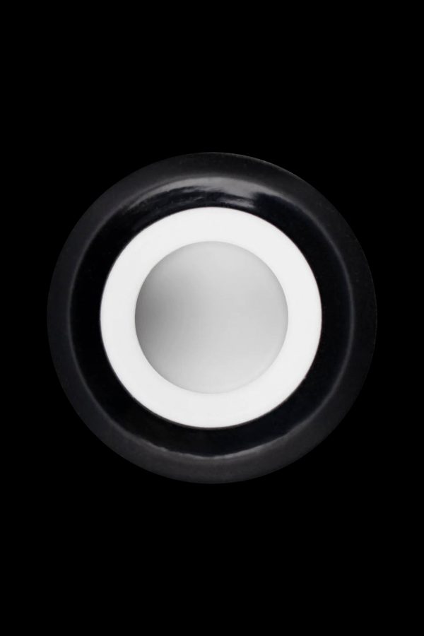 Black cannabis oil cartridge with white mouthpiece.