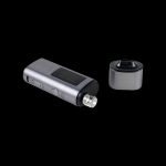 Sleek, silver cannabis vaporizer pen and detachable heating chamber on a black background.