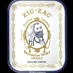 Overhead view of the Large Zig Zag Original Rolling Tray displaying vintage branding on a patterned surface.