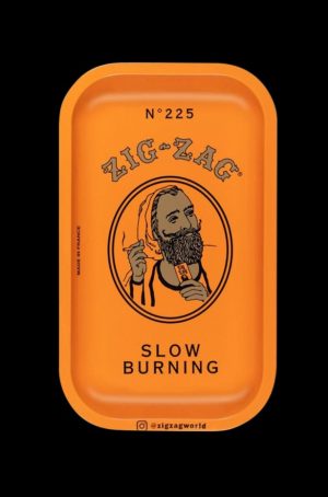 A close-up of the orange Zig Zag Small Metal Rolling Tray, displaying its minimalist design and branded text.