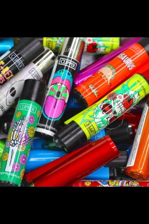 A colorful assortment of Clipper lighters with vibrant, psychedelic designs, scattered on a patterned surface.