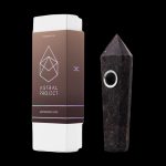 Astrophyllite gemstone pipe and its branded white packaging.