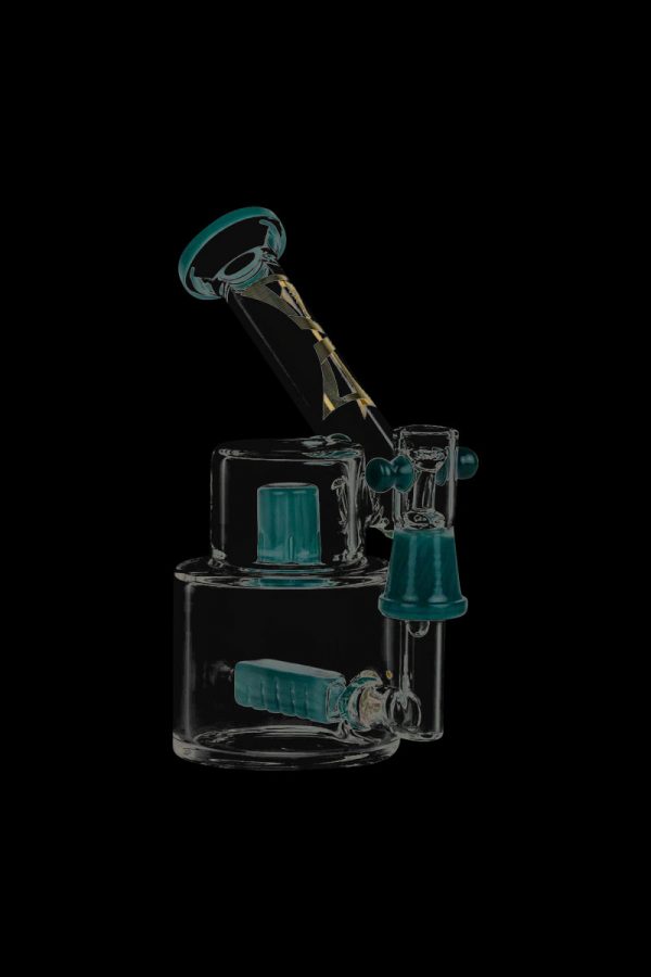 A studio shot of the Evolution Morning Glory Sidecar Dab Rig, showcasing its curved neck and clear glass construction.