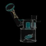 A three-quarter view of the Evolution Morning Glory Sidecar Dab Rig, showcasing its clear glass construction and unique sidecar attachment.