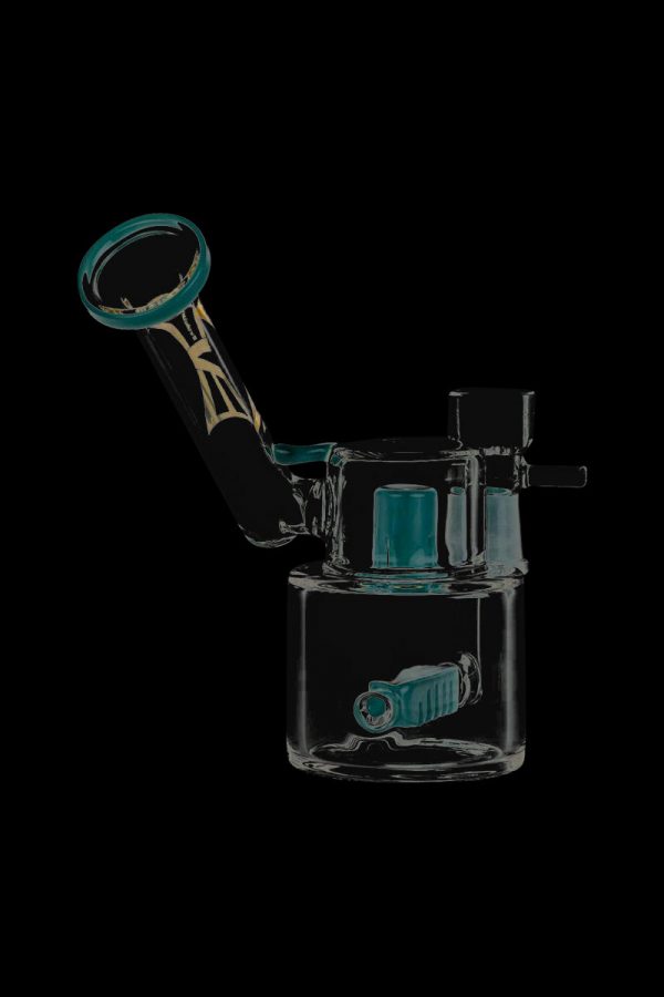 A three-quarter view of the Evolution Morning Glory Sidecar Dab Rig, showcasing its clear glass construction and unique sidecar attachment.