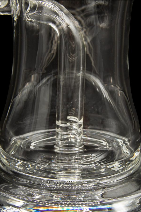 Close-up of a clear glass bong with intricate swirling patterns.