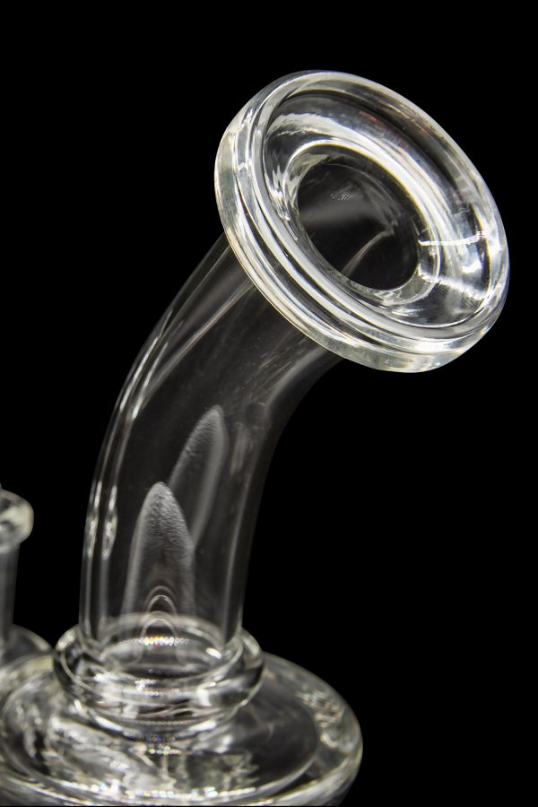 Clear glass bubbler or water pipe against a black background.