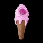 Pink ice cream cone-shaped glass pipe against a black background.