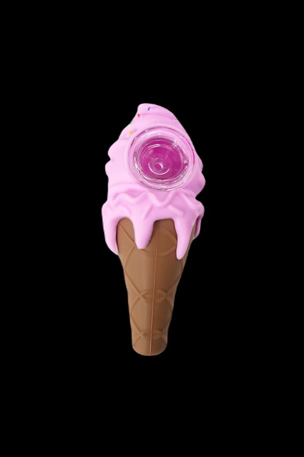 Pink ice cream cone-shaped glass pipe against a black background.