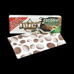 A close-up of Juicy Jay's 1 1/4 Coconut Rolling Papers package with a colorful design, angled slightly to showcase the branding.